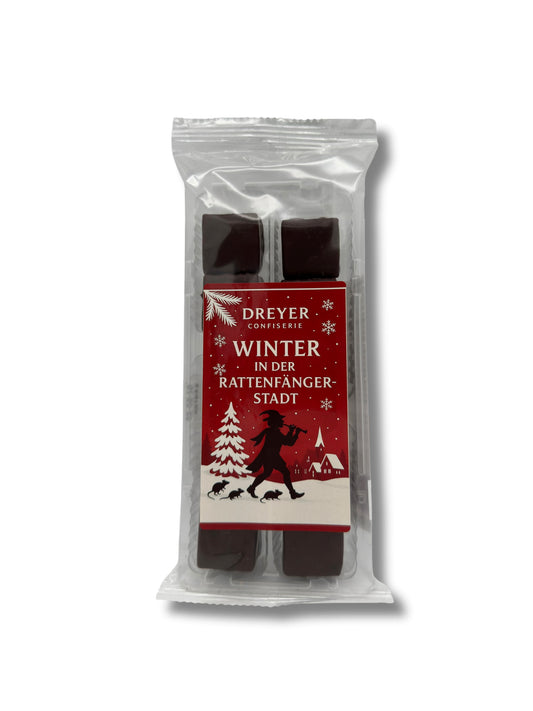 Verpackung "Winter in der Rattenfängerstadt" von Dominosteine Zartbitter 125 g.