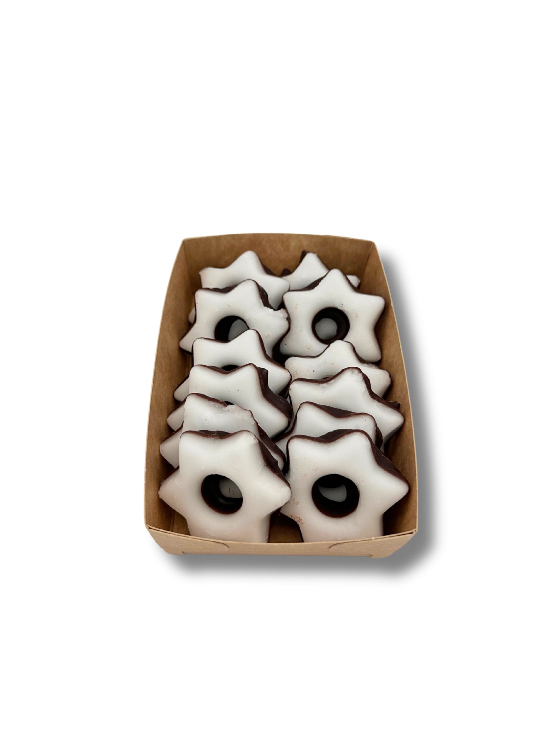 Fondantsterne Weiß – zarte Sterne aus kandiertem Fondant mit feiner Glasur, traditionelle Weihnachtssüßigkeit von Dreyer Confiserie Hameln.